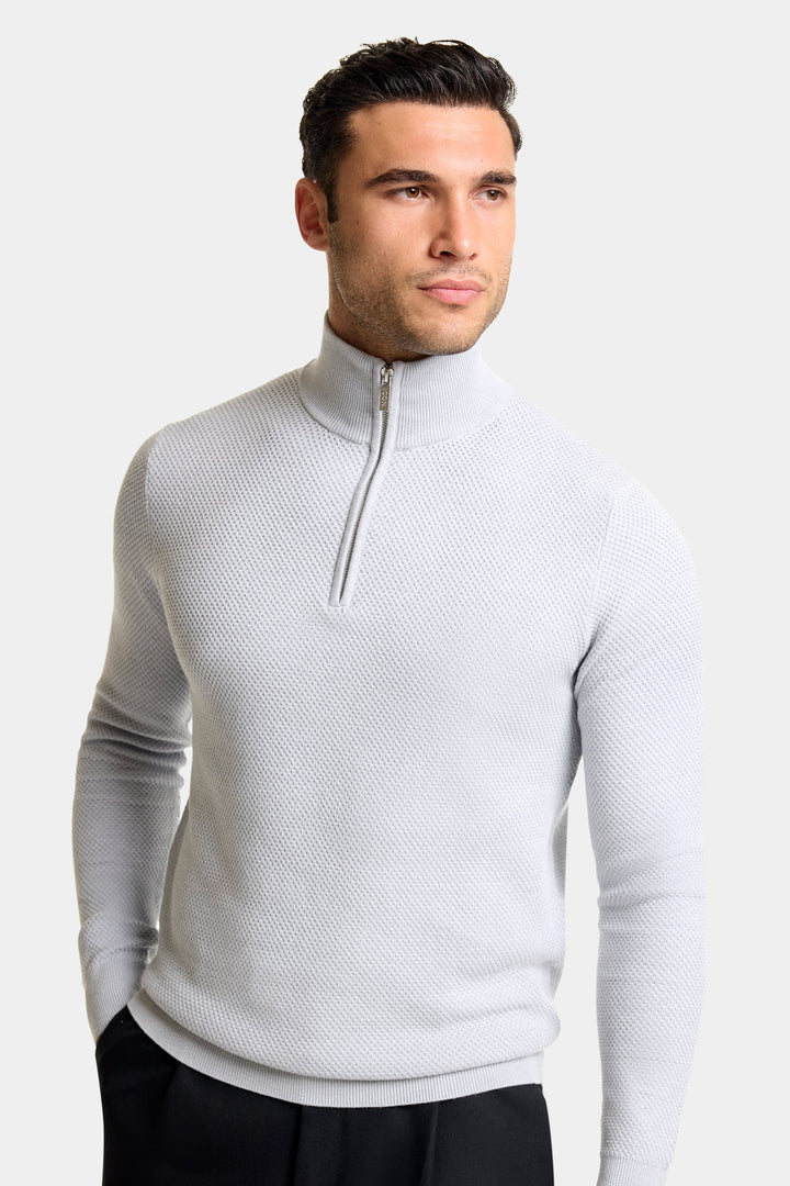 THE FABIO QUARTER ZIP SWEATER