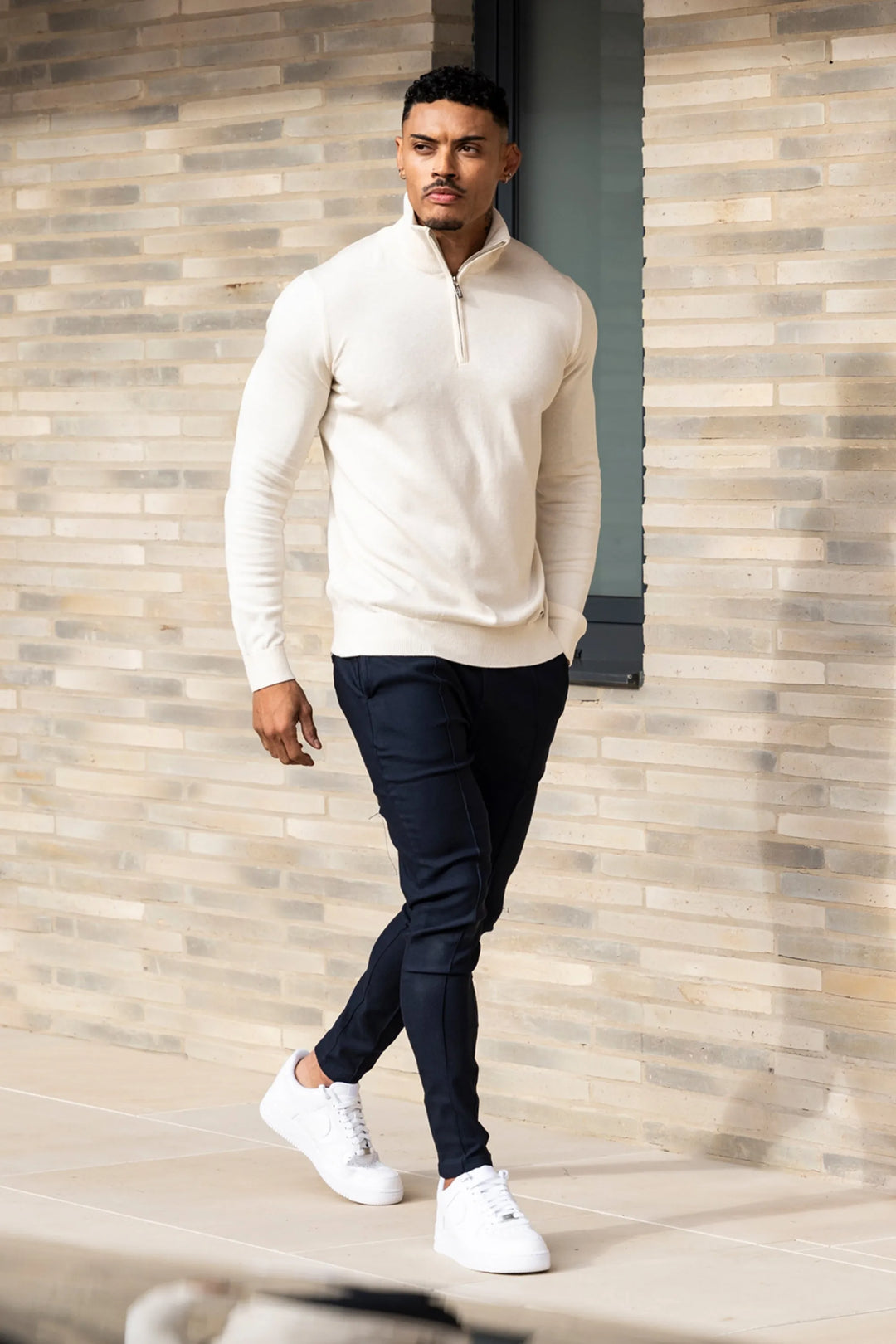 THE SANTONI QUARTER ZIP SWEATER