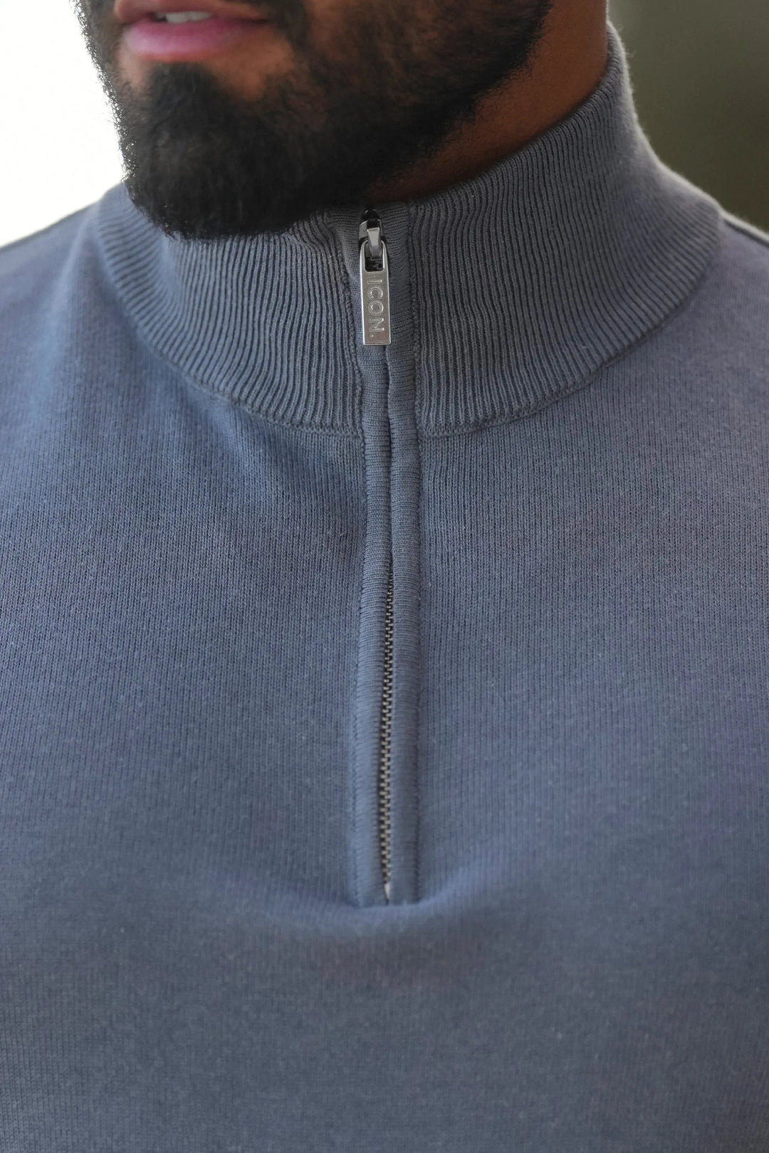 THE SANTONI QUARTER ZIP SWEATER