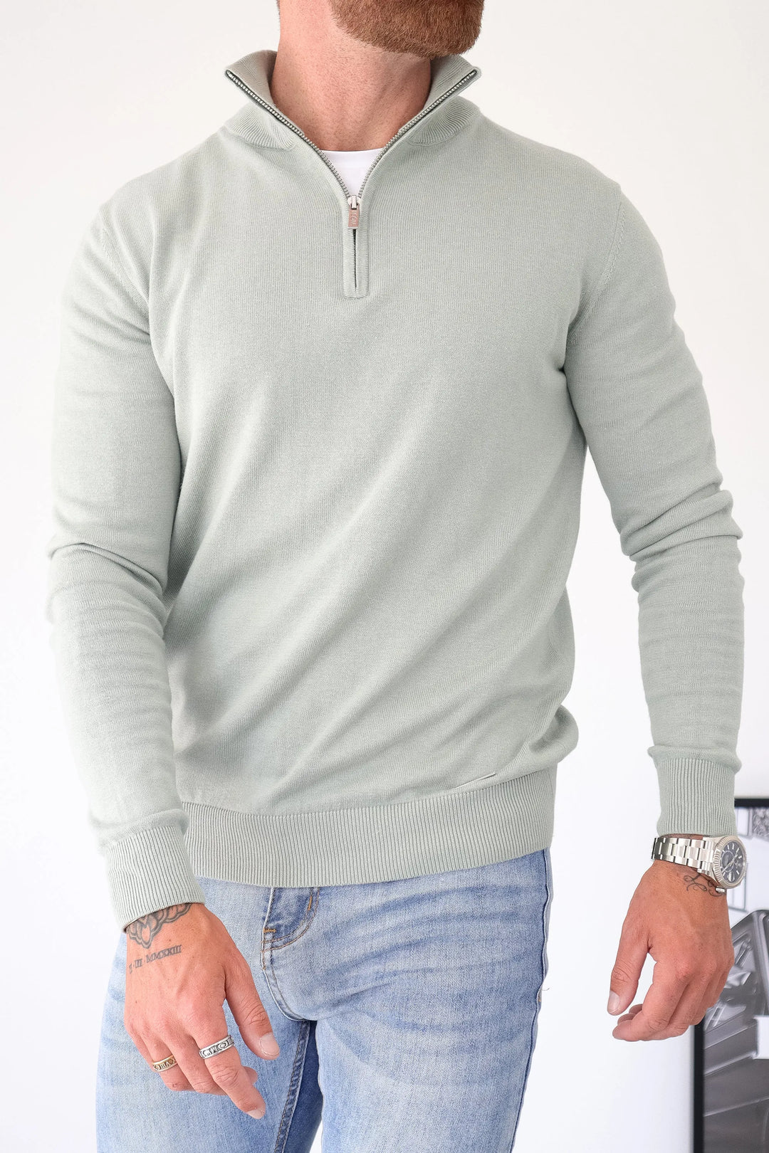 THE SANTONI QUARTER ZIP SWEATER