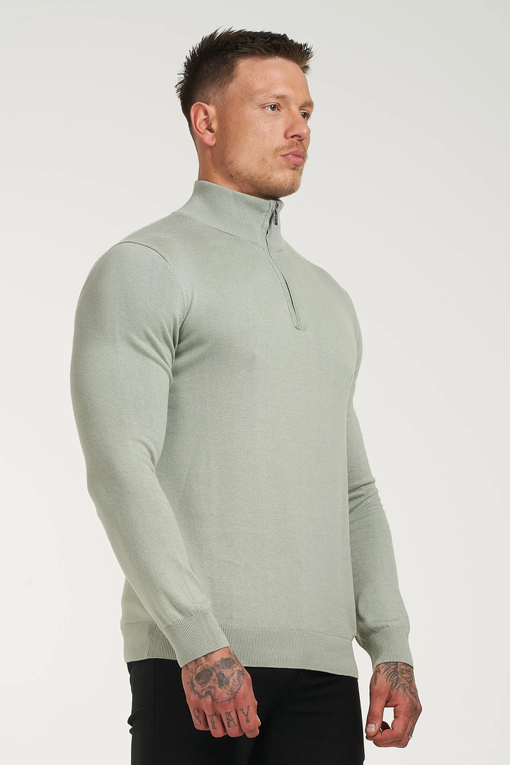 THE SANTONI QUARTER ZIP SWEATER