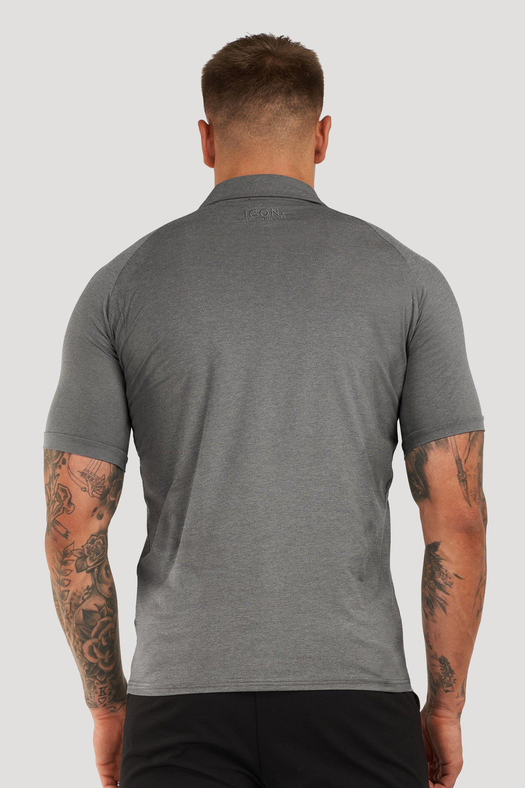 THE MUSCLE BUTTON POLO